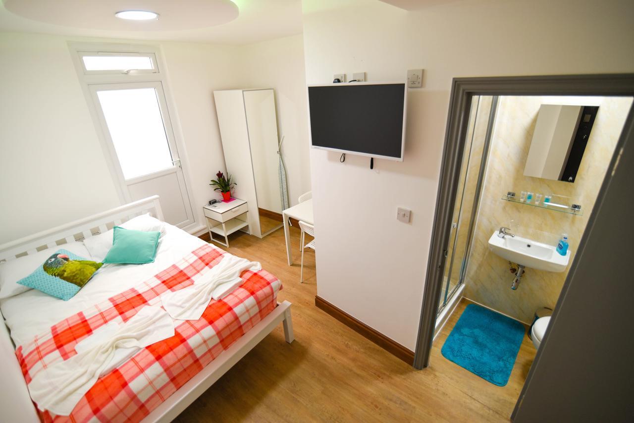 Green Suites Londres Quarto foto