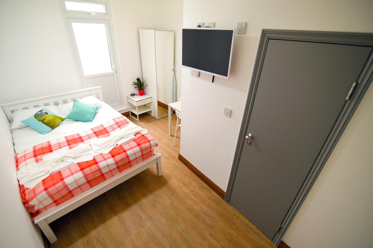 Green Suites Londres Quarto foto