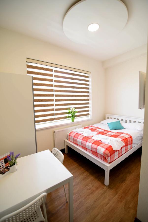 Green Suites Londres Quarto foto